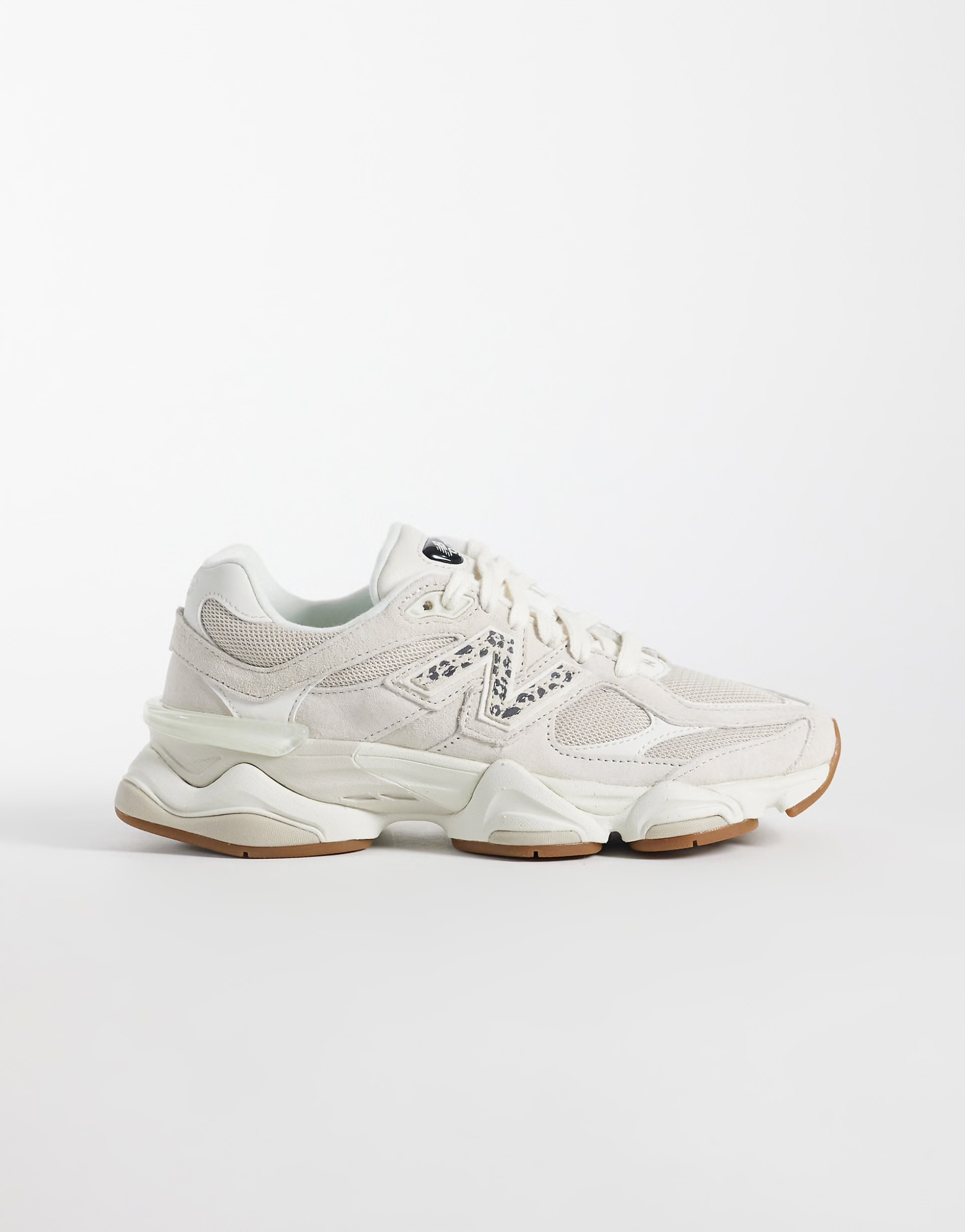 New Balance 9060 trainers in beige with leopard print detail