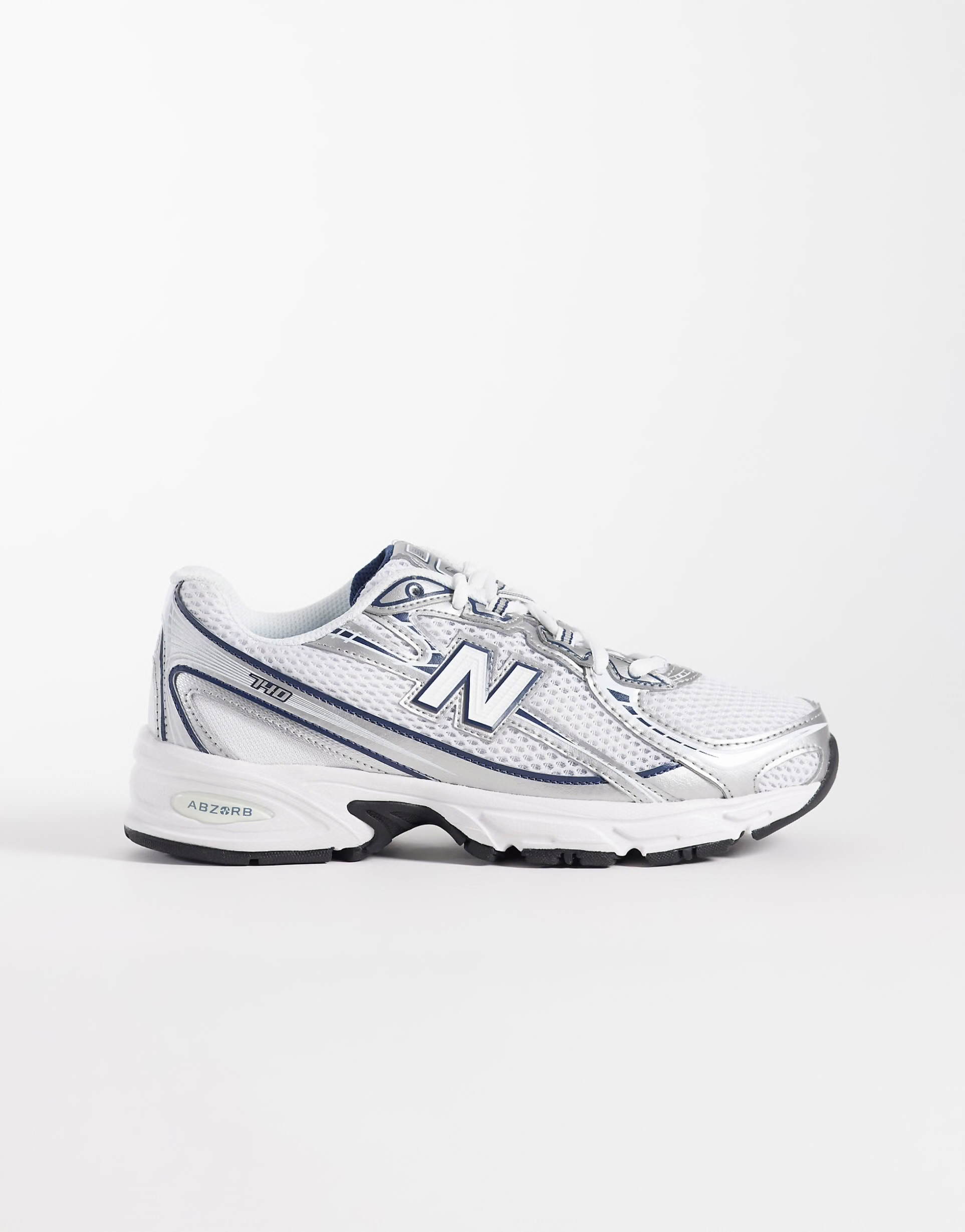 New Balance 740 trainers in navy and white