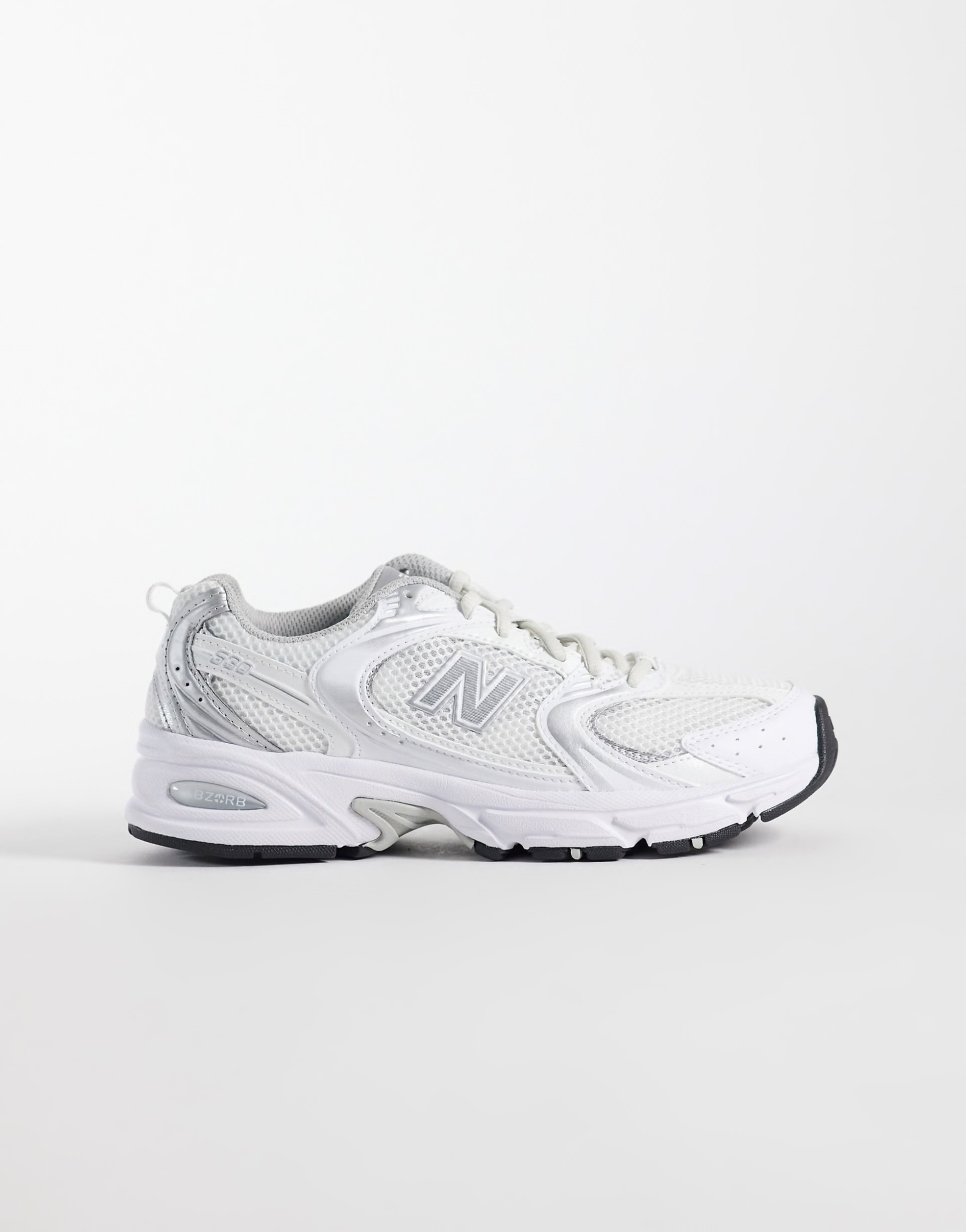 New Balance 530 trainers in white and silver